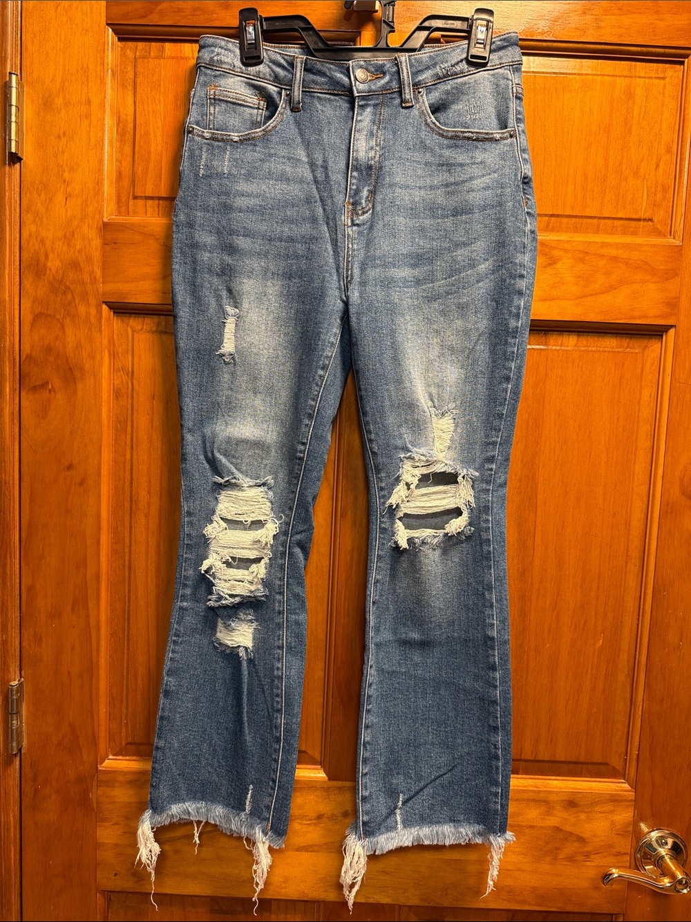 High-Rise Distressed Flare Jeans in Light Blue